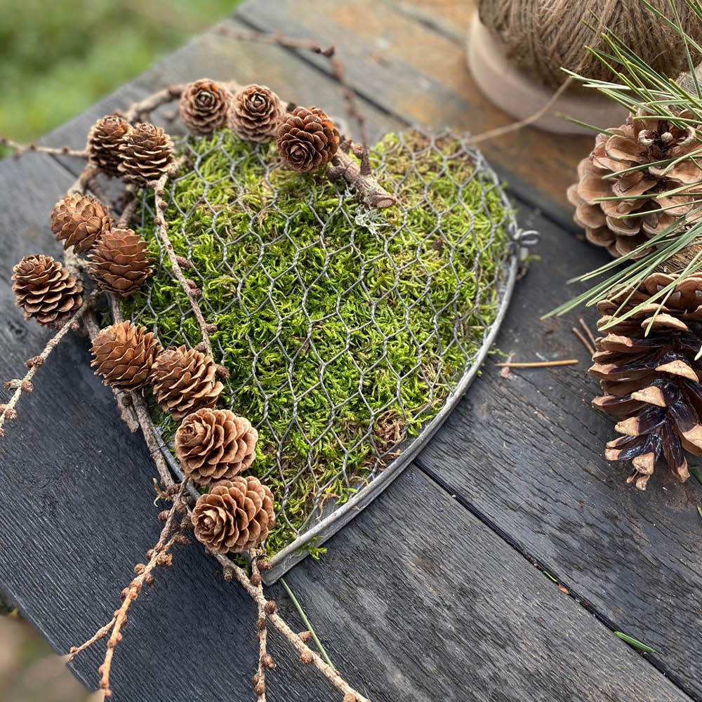 Metallherz Eldgarden dekoriert