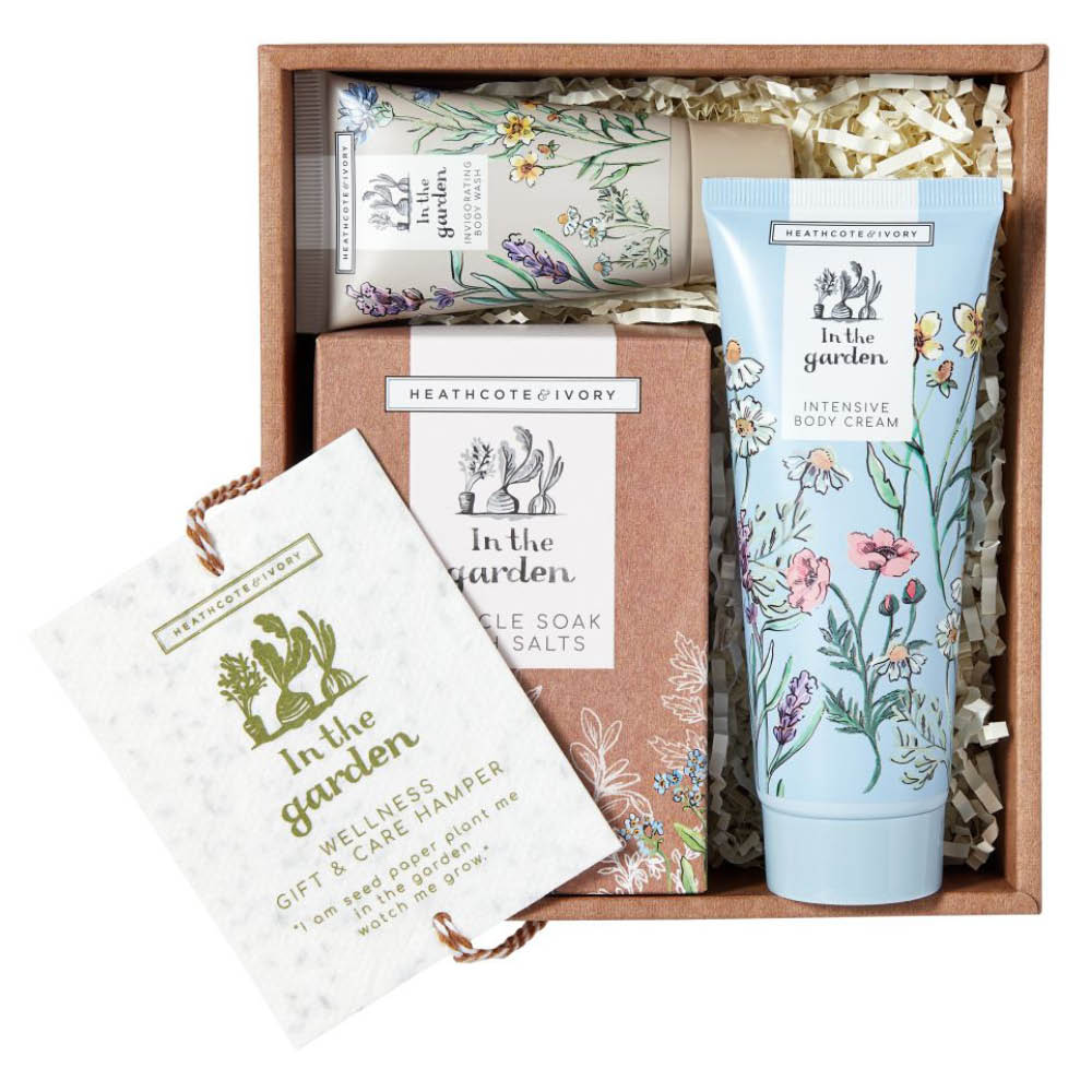 Geschenkset mit Gartenmotiv, bestehend aus Handcreme, Badesalzen und Körpercreme. Florale Verpackung in dekorativer Box.