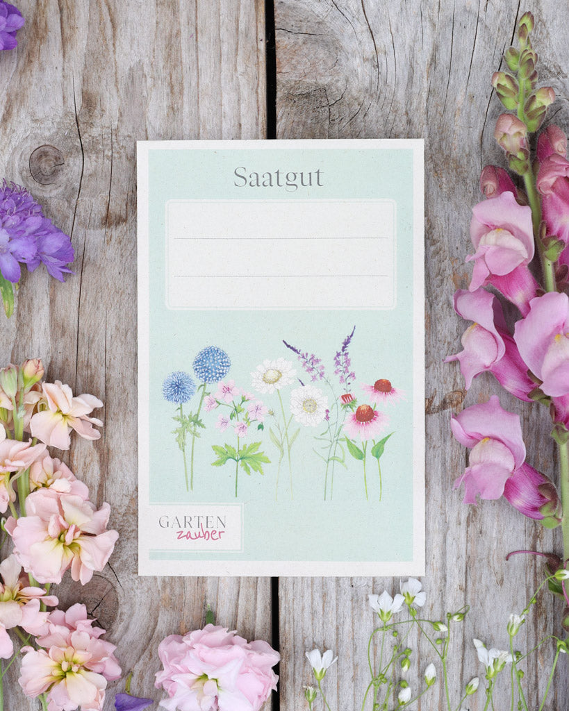 Detailaufnahme A6 Saatguttüten – Gartenzauber Papeterie mit floraler Illustration und beschriftbarem Feld.