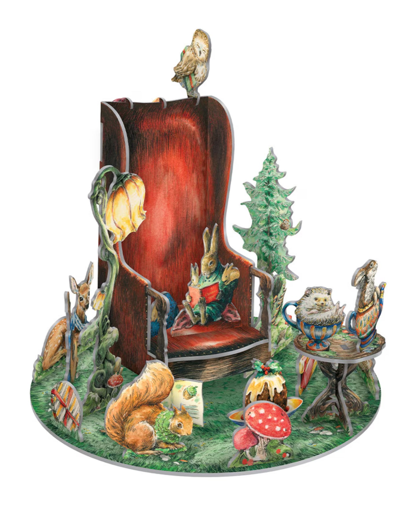Roger la Borde Storytime 3D-Adventskalender – aufgebaute Winterwald-Szene mit Hase im Lesesessel, Eule, Igel und Eichhörnchen in festlicher Umgebung, detailreich illustriert von Elise Hurst.