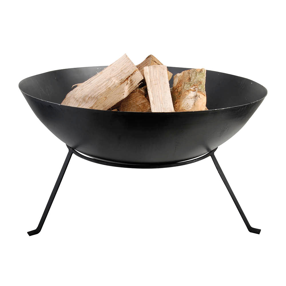 Schwarze Feuerschale mit kaminholz aus Gusseisen